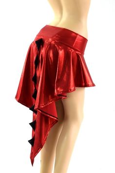 a mannequin wearing a red skirt with black bows on the bottom and side