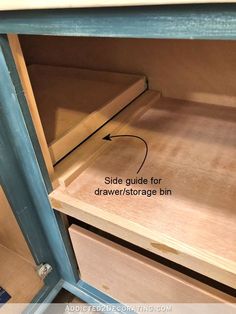 the drawers are closed and labeled with an arrow pointing to the side guide for drawer / storage bin