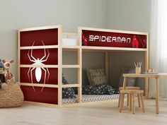 a child's bedroom with a spiderman bunk bed