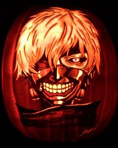 a pumpkin carved to look like an anime character