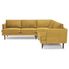 a large sectional couch with a footstool on the bottom and armrests