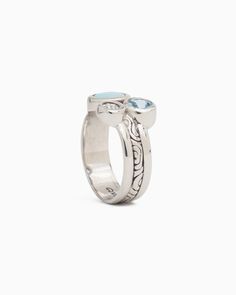 The Triple Stone Ring is a playful design with timeless details. Handcrafted in sterling silver, the ring showcases three stones of different shapes and sizes, symbolizing the three U.S. Virgin Islands: St. John, St. Thomas, and St. Croix. The band boasts a distinctive design, featuring a textured reef strip running through the middle. This versatile style can be worn alone for a statement look or stacked with other rings for a personalized touch. Metal: Sterling silver Stones: Larimar, Hampton Hook Bracelet, St Croix, Island Vibes, St Thomas, Virgin Islands, December Birthstone, Blue Gemstones, Versatile Style, Different Shapes