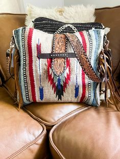 #frinedpineapple #fringedbabe #westernwear #cowgirl #cowboy #rodeooutfit #festivaloutfit #summerrodeo #theranchgirlsaddlebag #blanketbag #saddleblanketbag #tooledleatherstrap #westernpurse #rodeopurse #theranchgirl Saddle Blanket Purse, Western Bags Purses, Ranch Girl, Blanket Purse, Bohemian Style Bag, Aztec Bag, Horse Hair Tassels, Western Bag, Cowgirl Accessories