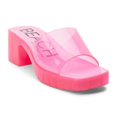 a women's pink slide - on sandal with clear straps and an open toe