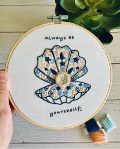 someone is holding up a hand embroidery project with the words always be yourself on it