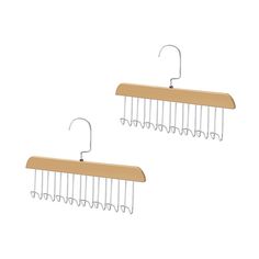 two wooden hangers with metal clips attached to them