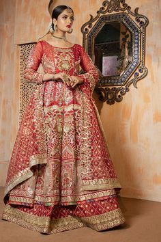 Embroidered Dulhan Dress in Designer Attire in heavy embroidery of tilla, Resham work with Hand Embellishment of Golden Reza, Dabka, nakshi, gotta, China Moti, Pearls, Crystal, Sequence, Swarovski on red frock paired with digital printed raw silk lehenga. Bridal dress with a magnificent detailing handcrafted with zardozi, dabke, Mukesh, and tilla work covering every inch of Pakistani bridal dress is looking purely charming. Raw Net Lehenga in the long tail is sparkling in ethereal beauty and cha Red Frock, Pakistani Bridal Dress, Raw Silk Lehenga, Anarkali Lehenga, Bridal Dupatta, Pearl Work, Net Lehenga, Embroidered Organza, Can Can