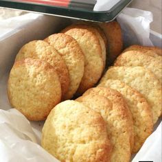 a bunch of cookies sitting in a container