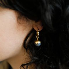 New stone options for our perfectly paired daisy cap and gemstone hoop earrings. Now on gold over sterling silver hoops; a higher quality hoop with greater longevity. Wear solo or pair with the Simone Necklace. Materials & Details Brass daisy caps 12mm grade A stones with natural variation Stone options: Aquamarine, Blue Kyanite, Blue Tigers Eye, Carnelian, Dalmation Jade, Faceted White Moonstone, Garnet, Golden Tigers Eye, Gray Agate, Green Aventurine, Green Onyx, Malachite, Opalite, Pyrite, Re Yellow Gold Gemstone Huggie Earrings For Everyday, Everyday Brass Jewelry With Birthstone, Everyday Yellow Gold Huggie Earrings With Birthstone, Gold Sterling Silver Huggie Earrings With Birthstone, Gold Round Huggie Earrings With Gemstone, Gold Dainty Gemstone Hoop Earrings, Yellow Gold Gemstone Hoop Earrings For Everyday, Everyday Yellow Gold Hoop Earrings With Gemstone, Dainty Gold Hoop Earrings With Gemstone