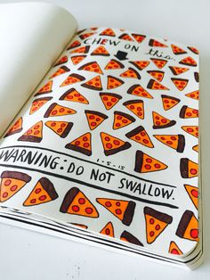 a book with pizza slices on it and the words warning don't swallow