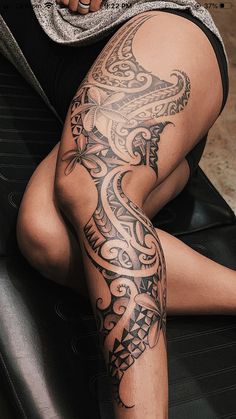 a man with a tattoo on his leg