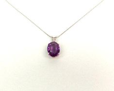 Amethyst Necklace / Sterling Silver Amethyst Pendant 4.15ct / Genuine Oval Amethyst Necklace / Purple Amethyst Necklace /February Birthstone******* FREE SHIPPING *******ANYWHERE IN THE UNITED STATESHANDMADE AND HAND SET FEBRUARY BIRTHSTONE NECKLACE 925 GENUINE AMETHYST IN A BASKET SETTING 4.15 ct.  THIS BEAUTIFUL GEMSTONE IS MEDIUM DARK PURPLE. THE NECKLACE COMES WITH A 16 OR AN 18 INCH STERLING SILVER CHAIN. PLEASE SPECIFY THE LENGTH WHEN ORDERING. METAL: STERLING SILVER 925STONES: GENUINE OVAL Purple Oval Gemstone Necklace, Classic Oval Amethyst Necklaces, Oval Lavender Gemstone Necklace, Classic Amethyst Oval Pendant Necklace, Nice Accessories, February Birthstone Necklace, Heartbeat Necklace, February Birthstone Jewelry, Amethyst Crystal Necklace