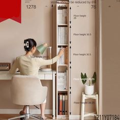 a woman sitting at a desk with a book shelf and lamp in front of her