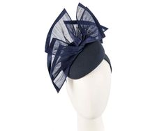 This exclusive fascinator is made right here, in Melbourne, by our experienced milliners. Classic navy  woolen base with hand-crafted silk abaca arrangement. It will be a highlight of your winter racing outfit.  Made in Australia  Comfortable headband  Bespoke design Fitted Winter Evening Fascinator, Winter Evening Fascinator, Elegant Winter Races Fascinator, Fitted Winter Fascinator For Races, Racing Outfit, Classy Hats, Comfortable Headbands, Bespoke Design, Fascinator