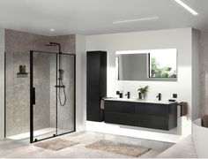 a modern bathroom with black and white fixtures