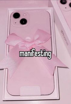 an iphone case with a pink bow on it and the words manifiesting