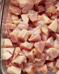 chopped meat in a glass dish on a table