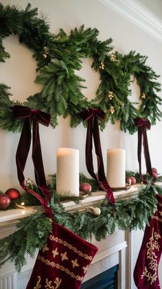 christmas stockings and candles are hung on the mantle