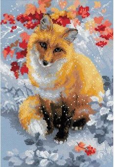 a cross stitch picture of a fox sitting in the snow