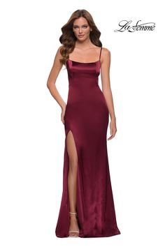 Indulge in the sophisticated elegance of the La Femme 29945 evening dress. Crafted from luxurious satin, this timeless beauty embraces your curves with a fitted silhouette. The low back, scoop neckline, and side slits add a touch of sensuality, ensuring all eyes are on you. Make magical memories in this enchanting piece of timeless beauty. Simple Prom Dress Long, Straight Across Neckline, Sheath Skirt, Modest Prom, Prom Style, Floor Length Gown, Satin Gown, Burgundy Dress, Dress Silhouette