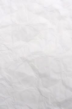 a white sheet of paper that has been wrinkled over