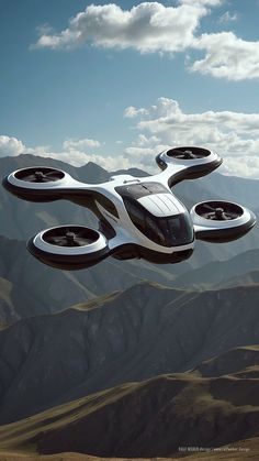 a futuristic flying vehicle in the air over mountains and valleys with clouds above it, as seen from an aerial view