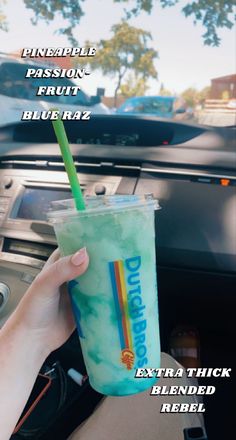 a person holding up a drink in their hand with the caption's description below it