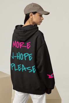 We just can't get enough of J-Hope. More J-Hope please! This hoodie comes with a statement back design and a subtle Jack in the Box inspired detail on the right sleeve. Perfect for every BTS J Hope stan.  * 50% pre-shrunk cotton, 50% polyester * Fabric weight: 8.0 oz/yd² (271.25 g/m²) * Air-jet spun yarn with a soft feel and reduced pilling * Double-lined hood with matching drawcord * Quarter-turned body to avoid crease down the middle * 1 × 1 athletic rib-knit cuffs and waistband with spandex * Front pouch pocket * Double-needle stitched collar, shoulders, armholes, cuffs, and hem This product is made especially for you as soon as you place an order, which is why it takes us a bit longer to deliver it to you. Making products on demand instead of in bulk helps reduce overproduction, so tha Kpop Hooded Sweatshirt For Winter, Kpop Hooded Sweatshirt For Fall, Kpop Style Hooded Sweatshirt For Fall, Kpop Hoodie With Letter Print For Winter, Kpop Style Hooded Hoodie For Streetwear, Kpop Style Winter Streetwear Sweatshirt, Kpop Style Hoodie With Letter Print, Kpop Hooded Sweatshirt With Letter Print, Kpop Letter Print Sweatshirt For Streetwear