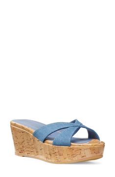 A cork wedge boosts this sandal topped with glossy leather straps. 3" heel; 1 1/2" platform Leather upper/synthetic lining/leather and synthetic sole Made in Spain Washed Denim, Wedge Sandal, Sandal Women, Cork Wedge, Flat Sandals, Denim Wash, Stuart Weitzman, Wedge Sandals, Women's Shoes Sandals