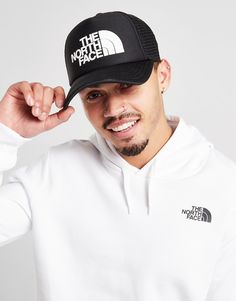 Step up your look with some outdoor style with this Logo Trucker Cap from The North Face. In a black colourway, this cap is made from durable cotton for a comfy wear that keeps its shape. With mesh to the back for a breathable wear, this cap has a snapback fastening for the perfect fit. With a curved peak, this cap is finished with white The North Face branding to the crown. North Face Cap, Football Calendar, North Face Brand, Comfy Wear, Face Logo, Football Training, Football Kits, Jd Sports, Outdoor Style