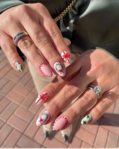 Get inspired with our festive Christmas nails ideas! Discover a variety of dazzling designs, from classic red and green holiday looks to trendy glitter and snowflake patterns. Perfect for holiday parties or cozy gatherings, these nail art ideas will add a cheerful touch to your celebrations. Whether you prefer short or long nails, we've got you covered with step-by-step guides and creative tips. Make your nails a part of your holiday cheer with these stunning Christmas nail inspirations! Mix Match Christmas Nails, Mix And Match Christmas Nails, Quirky Christmas Nails, Christmas Nails Fun, Christmas Nail Design Ideas, Christmas Cartoon Nails, Fun Christmas Nail Designs, 2024 Christmas Nails, Vintage Christmas Nails