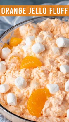 orange jello fluff dip in a bowl with marshmallows on top