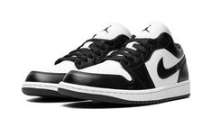 The Women’s Air Jordan 1 Low “Panda” is a women’s-exclusive version of the classic basketball shoe in the popular black-and-white colorway.  The “Panda” colorway theme rose to fame on the Nike Dunk before it began appearing on other classic sneakers like the Jordan 1 Low.  White leather appears on the shoe’s base while black leather is found on the overlays and on the Swoosh.  A white leather “Wings” logo is embroidered on the heel and a black Jumpman appears on the tongue.  Release date: March Black And White Air Jordan 1 Low, Popular Nike Shoes Women, Jordan Panda, Jordan 1 Panda, Jordans Low, Popular Nike Shoes, Leather Wings, Sick Shoes, Black And White Jordans