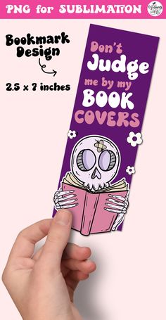 a hand holding up a purple bookmark with the words don't judge me by my book covers