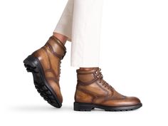 The Daroca is a casual wingtip boot. Featuring our supple calfskin leather, this comfortable boot utilizes brogue wingtip detailing to set it apart from the rest. The Daroca features a cushioned rubber lug sole finished with an extended leather welt for a perfect casual boot aesthetic. Luxury Lace-up Brogue Detailed Boots, Luxury Lace-up Boots With Brogue Detailing, Leather Wingtip Work Boots With Brogue Detailing, Calf Leather Ankle Boots With Brogue Detailing, Casual Wingtip Lace-up Boots For Business, Casual Boots With Brogue Detailing And Moc Toe, Casual Moc Toe Boots With Brogue Detailing, Casual Goodyear Welted Calf Leather Boots, Business Wingtip Boots With Vibram Sole