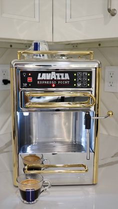 a coffee maker sitting on top of a counter