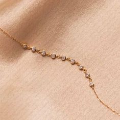 2mm Nine Diamond Link Floating Bracelet, Delicate Dainty Chain Bracelet, Bezel Set Moissanite Bracelet, Solitaire Diamond Bracelet  Also Available Gold Color: Yellow Gold,Rose Gold,White Gold.  ✦Gemstone: Moissanite ✦Shape: Round Brilliant  ✦Chain style: Cable ✦Stone Size : 2mm Approx. ✦Total Weight  : 0.27ct Approx.  ✦Clarity: VVS ✦Gemstone: Lab grown Diamond ✦Shape: Round Brilliant Cut ✦Chain style: Cable ✦Stone Size : 2mm Approx. ✦Total Weight  : 0.27ct Approx.  ✦Clarity: SI ✦Lab Grown Diamond ✦Bracelet Type: Bracelet Metal Type: Solid 9k ,14K & 18K Gold    ✦ Bracelet Length : 6 Inches (resizable and charges apply) ▷ Returns & Exchanges I understand how important it is to love what you buy! If, for any reason, you are not satisfied with your purchase, I gladly accept returns, exchanges, Floating Bracelet, Moissanite Bracelet, 18k Gold Bracelet, Ladies Bracelet, Gold Armband, Dainty Chain, Eco Friendly Jewelry, Wedding Jewelry Bracelets, Solitaire Diamond