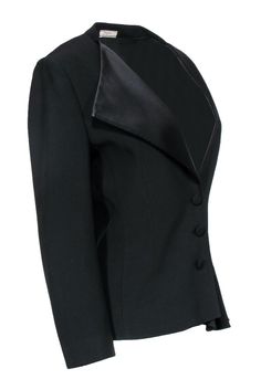 Elevate the classic blazer with this jacket from Bouchra Jarrar! An asymmetrical neckline and flounce add edge to this timeless piece. Perfect for bringing a unique twist to your professional style. Pair with slacks and pumps and you'll be best dressed at the office. Size 12 (EU 42) Shell: 55% Viscose, 45% Acetate Lining: 100% Silk Front button up closure Clasp at neckline Lined Flounce on left side of hem Asymmetrical neckline Shoulder padding Shoulder to shoulder 17" Bust 40" Waist 34" Sleeve Elegant Asymmetrical Blazer For Party, Asymmetrical Fitted Party Blazer, Asymmetrical Fitted Blazer For Parties, Fitted Asymmetrical Party Blazer, Fitted Asymmetrical Blazer For Parties, Semi-formal Asymmetrical Chic Blazer, Chic Asymmetrical Semi-formal Blazer, Tailored Asymmetrical Blazer For Parties, Elegant Asymmetrical Evening Blazer