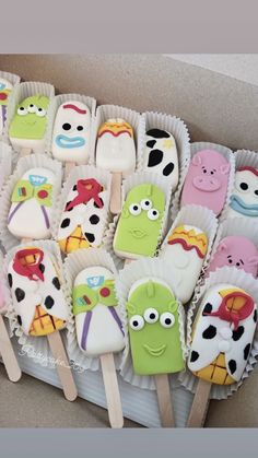 some kind of cake pops with characters on them