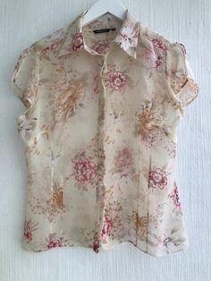 00s blouse sheer floral shortsleeved fitted top size s 38 transparent fabric Bust 52cm x2 Lenght 59cm Condition excellent Feminine Floral Print Short Sleeve Top, Feminine Short Sleeve Floral Print Top, Fitted Floral Print Blouse For Summer, Elegant Short Sleeve Top With Floral Print, Elegant Short Sleeve Floral Print Top, Sheer Fitted Shirt For Summer, Fitted Sheer Summer Shirt, Elegant Short Sleeve Floral Print Shirt, Elegant Short Sleeve Floral Shirt