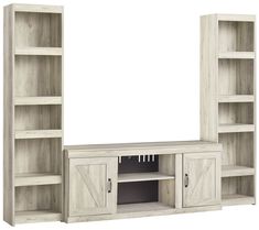 a white entertainment center with sliding doors and shelves