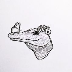 a drawing of a lizard with a flower in its hair