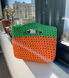 "is she an orange? or a pumpkin... or a CARROT! 🥕 orange and green colored, 100% ribbon cotton yarn! machine wash cool, air dry  9\" x 7\"" Casual Orange Rectangular Crochet Bag, Orange Rectangular Crochet Bag For Shopping, Orange Rectangular Crochet Bag For Daily Use, Rectangular Orange Crochet Bag For Daily Use, Top Handle Bags, Orange And Green, A Pumpkin, Cotton Yarn, Air Dry