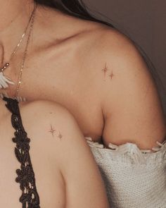 a woman's shoulder with stars on it