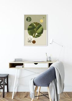 a chair sitting in front of a desk with a plant on it