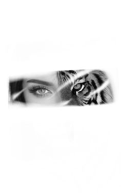 a woman's eye is seen through the reflection of a tiger in black and white