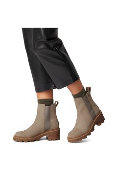 An essential Chelsea boot with a sleek, waterproof leather upper and lug sole can easily be styled up or down to match your mood. Waterproof: protects against rain, puddles and slush to keep feet dry in wet conditions 2 1/4" heel; 3/4" platform (size 8.5) 5 3/4" shaft Pull-on style with elastic gore insets Removable insole Leather and textile upper/textile and synthetic lining/rubber sole Imported Casual Moto Boots With Lug Sole For Outdoor, Casual Moto Boots With Lug Sole For Outdoor Activities, Waterproof Ankle-high Moto Boots For Fall, Casual Waterproof Boots With Leather Footbed For Fall, Weatherproof Workwear Boots For Fall, Leather Waterproof Boots With Padded Ankle For Fall, Trendy Waterproof Outdoor Boots, Everyday Winter Leather Boots, Modern Waterproof Boots With Round Toe For Fall