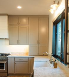 the kitchen is clean and ready for us to use in its new owner's home