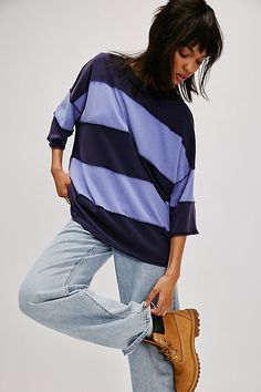 A modern take on a wardrobe staple, this easy tee from We The Free is featured in an oversized style with wide stripes and exposed seams. **Fit:** Relaxed, oversized **Features:** Comfy cotton fabrication, classic crew neckline, drop-shoulder short sleeves, wide stripes, exposed seams **Why We | We The Free Maddie Tee at Free People in Blue, Size: S Oversized Striped Top For Layering, Oversized Tops With Contrast Stripes For Layering, Oversized Spring Top With Striped Hem, Spring Oversized Top With Striped Hem, Oversized Striped Hem Tops For Spring, Oversized Tops With Striped Hem For Spring, Striped Oversized Top For Layering, Oversized Trendy Top With Contrast Stripes, Trendy Oversized Top With Contrast Stripes