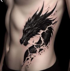 a man's chest with a black dragon tattoo on the side and his lower back